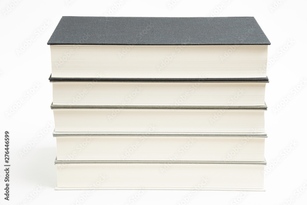 A set of five neatly stacked and arranged monochromatic cloth-bound books on a plain white background.