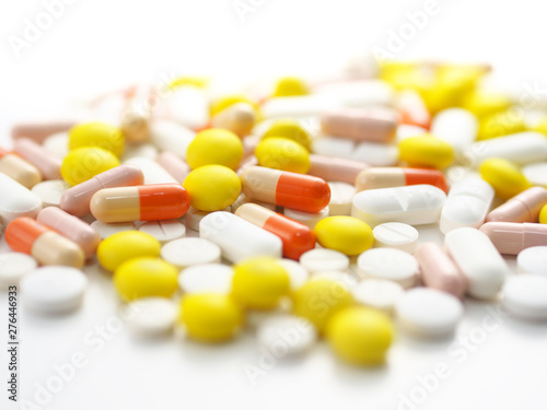 Pills on white background
