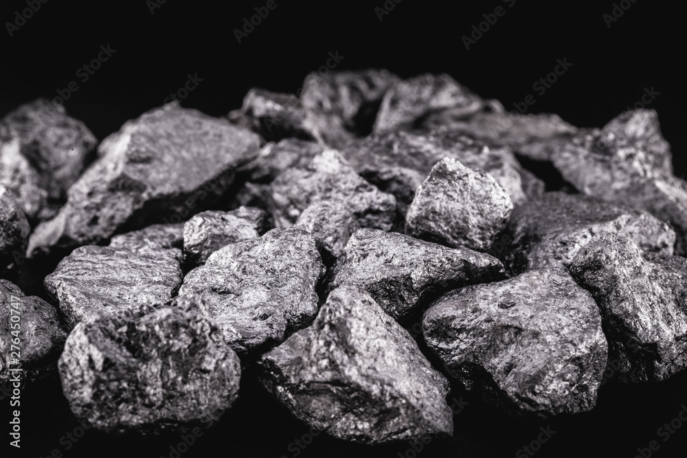 big silver nugget on black background. Raw silver stone, native silver nugget from Liberia, isolated on black background. Mineral extraction. big silver nugget on black background. Raw silver stone, native silver nugget from Liberia, isolated on black background. Mineral extraction.