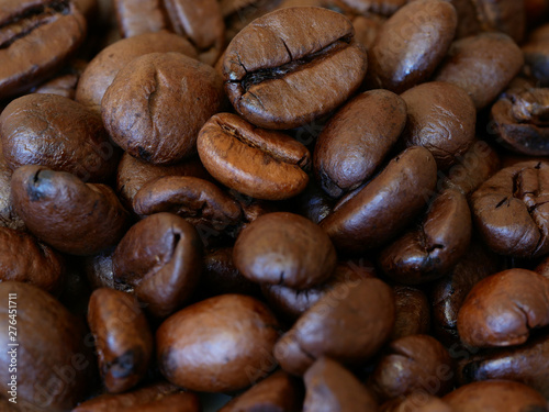 Fototapeta Naklejka Na Ścianę i Meble -  Close-up of Roasted Coffee Beans, Background With Selected Focus