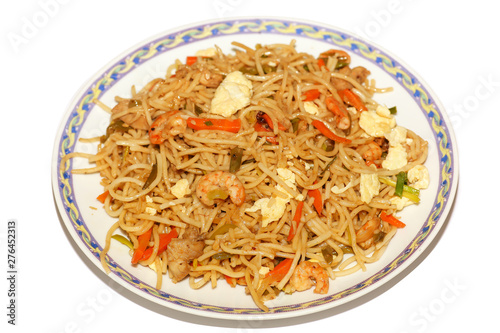Hakka chicken chowmein  (noodles) meal with prawn and egg in close up macro view. Mixed chowmein noodles with vegetables is a popular Chinese cuisine in India photo