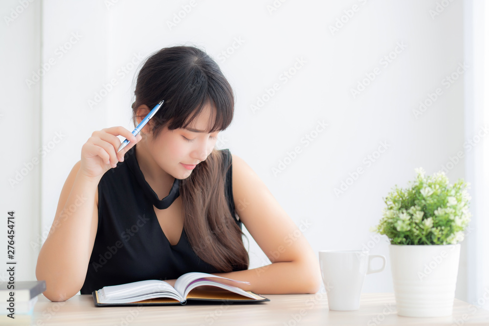 Beautiful asian woman writer thinking idea and writing on notebook or diary with happy on desk office, lifestyle of asia girl is success, female planning working, education and business concept. Beautiful asian woman writer thinking idea and writing on notebook or diary with happy on desk office, lifestyle of asia girl is success, female planning working, education and business concept.