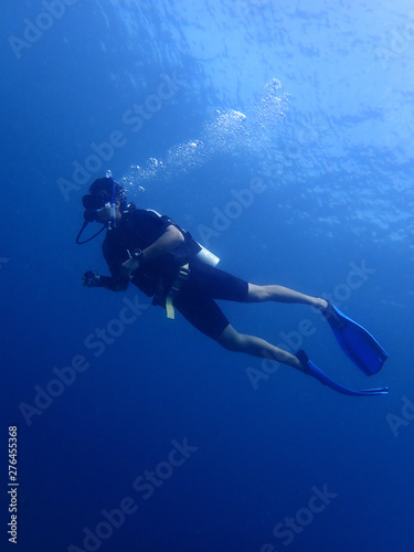 A scuba diver enjoy a leisure dive in Tunku Abdul Rahman Park, Kota Kinabalu. Sabah, Malaysia. Borneo. 
