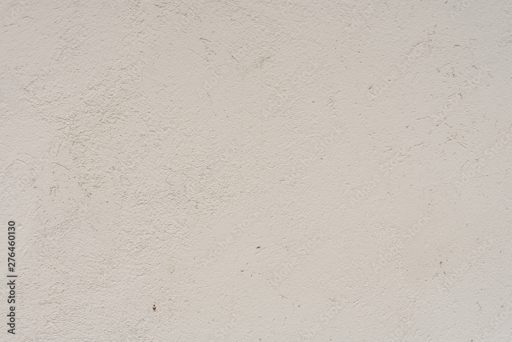 Texture of a concrete wall with cracks and scratches which can be used as a background