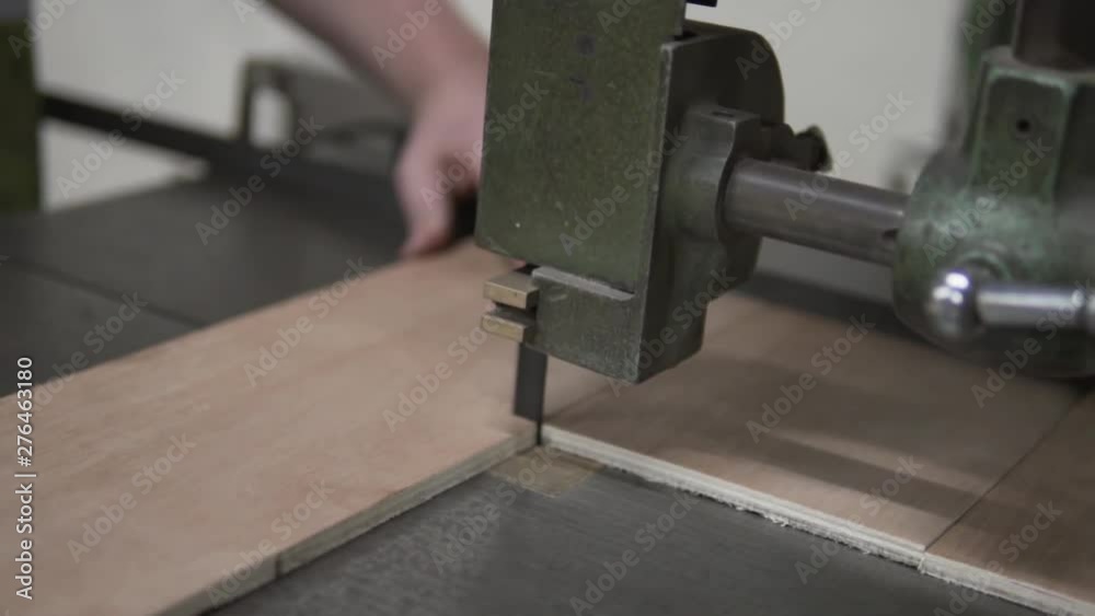 Man cutting wood with bandsaw 100fps slowed to 30% Man cutting wood with bandsaw 100fps slowed to 30%