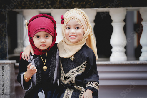 Muslim children smiling with happiness. Family and relationship of children concept.