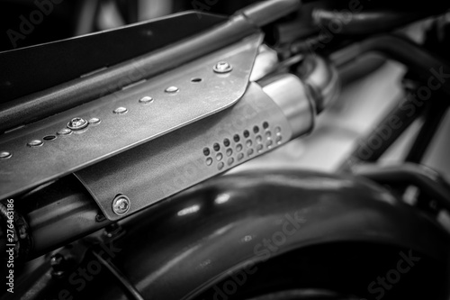 Black and white image of vintage motorbike closeup