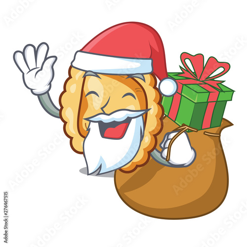 Santa with gift ravioli on the a mascot table