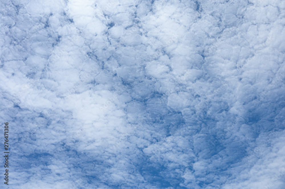 White clouds cluster on blue sky background White clouds cluster on blue sky background
