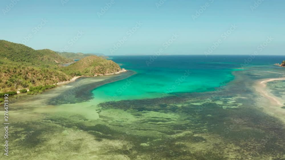 Aerial drone coastline of a tropical island with coral reef and blue lagoon. Busuanga, Palawan, Philippines. tropical landscape Aerial drone coastline of a tropical island with coral reef and blue lagoon. Busuanga, Palawan, Philippines. tropical landscape