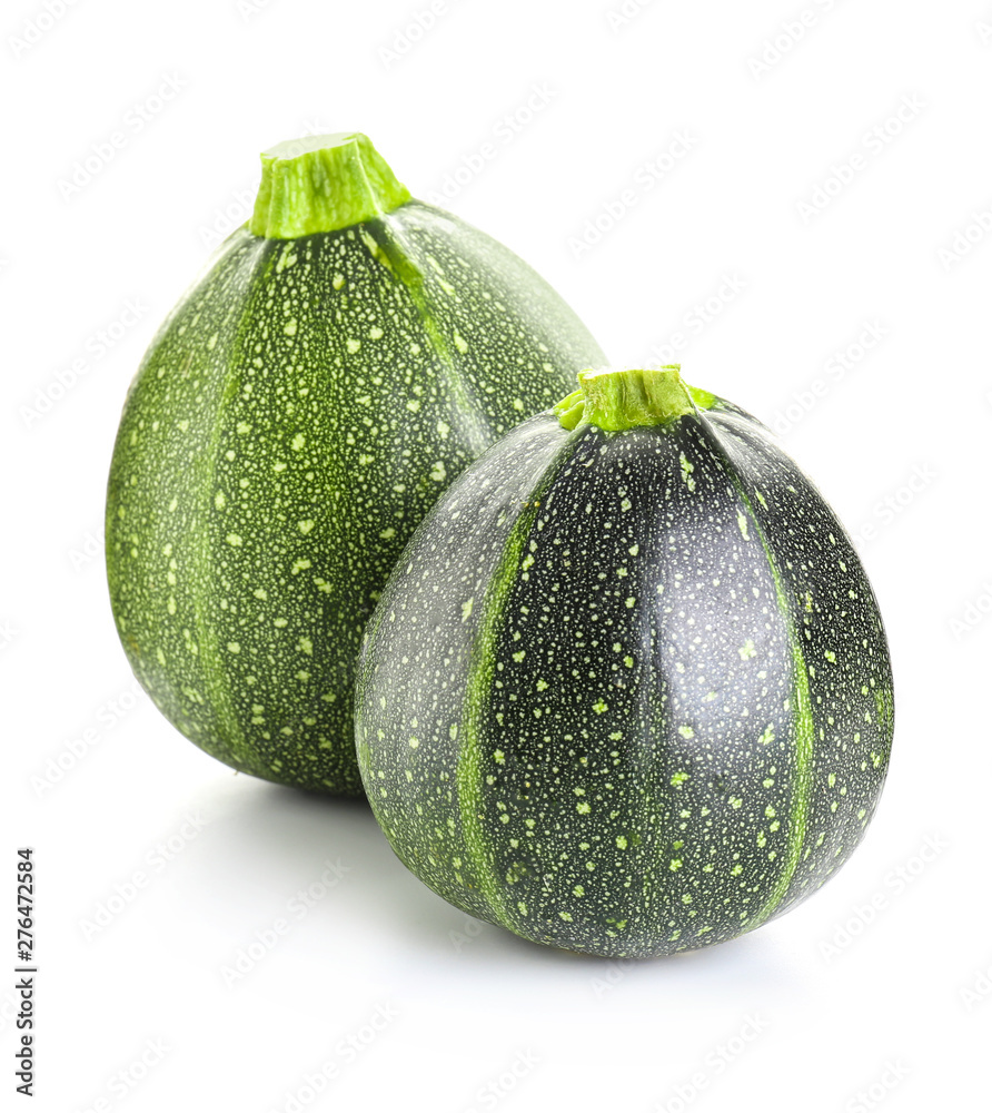 Fresh zucchini squashes on white background Fresh zucchini squashes on white background