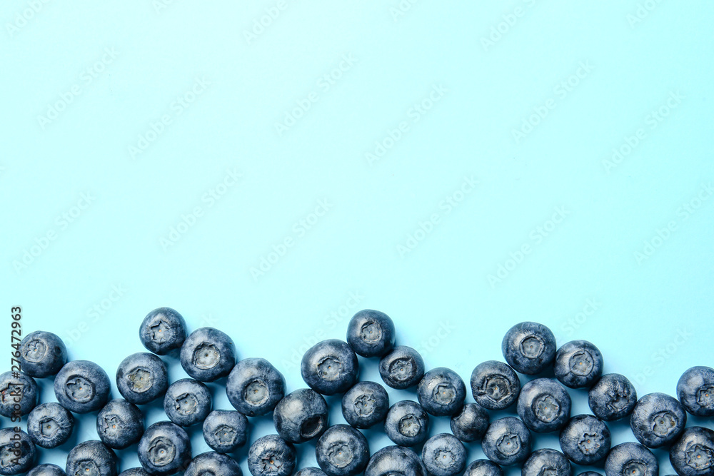Many ripe blueberry on color background Many ripe blueberry on color background