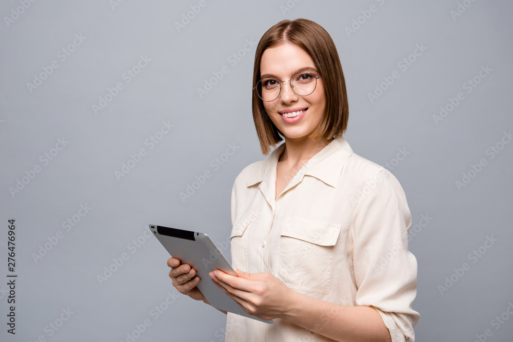 Close up side profile photo beautiful attractive she her business lady chief e-book hands arms reader data startup novelty interested curious wear specs casual white shirt isolated grey background Close up side profile photo beautiful attractive she her business lady chief e-book hands arms reader data startup novelty interested curious wear specs casual white shirt isolated grey background