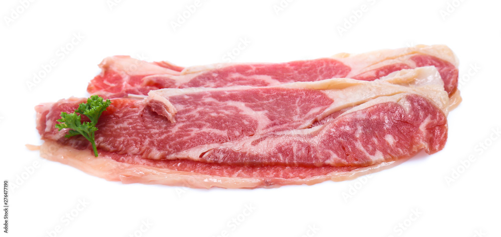 Fresh raw beef meat slices isolated over white background