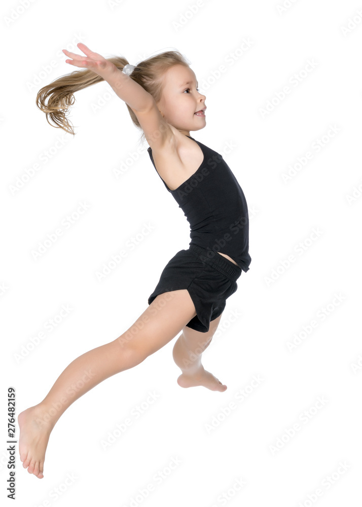 Girl gymnast jumping. The concept of sport and fitness. Girl gymnast jumping. The concept of sport and fitness.