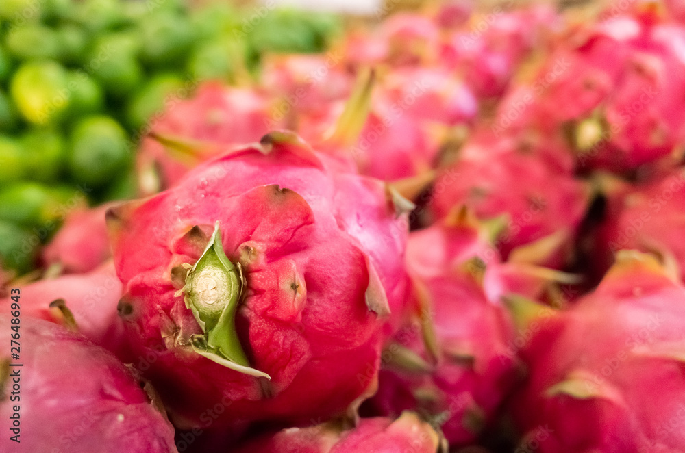 Fototapeta premium group of pitaya fruit at traditional marketplace