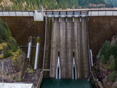 View at a dam of Detroit hydro electrical plant - massive concrete dam at North Santiam river, Oregon photo