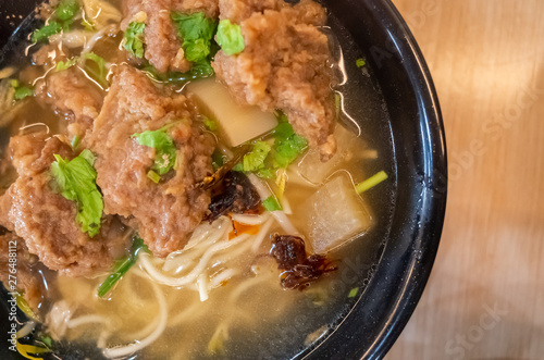 Taiwanese food of soup noodles with pork ribs cakes