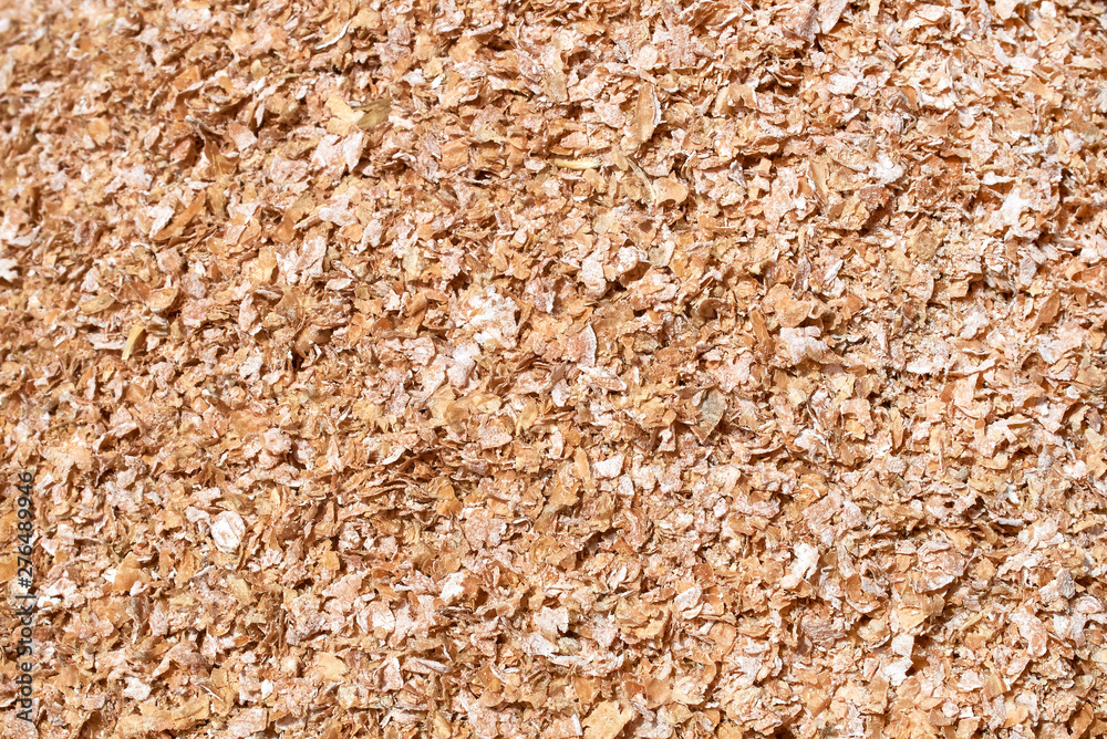 Background texture of crushed seed and grain mix for livestock and bird feed Background texture of crushed seed and grain mix for livestock and bird feed