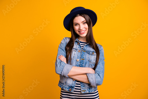 Portrait of her she nice-looking sweet attractive lovely lovable fascinating feminine cheerful cheery straight-haired lady folded arms isolated over bright vivid shine yellow background