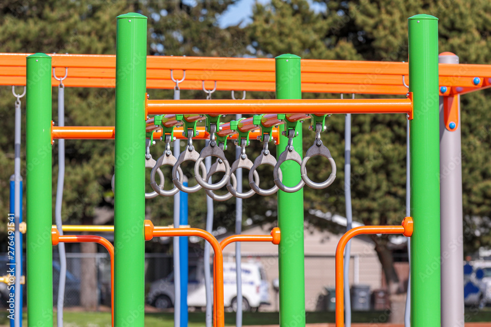 Climbing structures - monkey bars and monkey rings on a school playground.  Stock Photo | Adobe Stock
