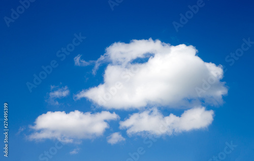 blue sky background with tiny clouds