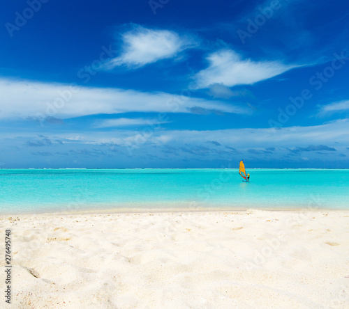  Maldives island with white sandy beach and sea