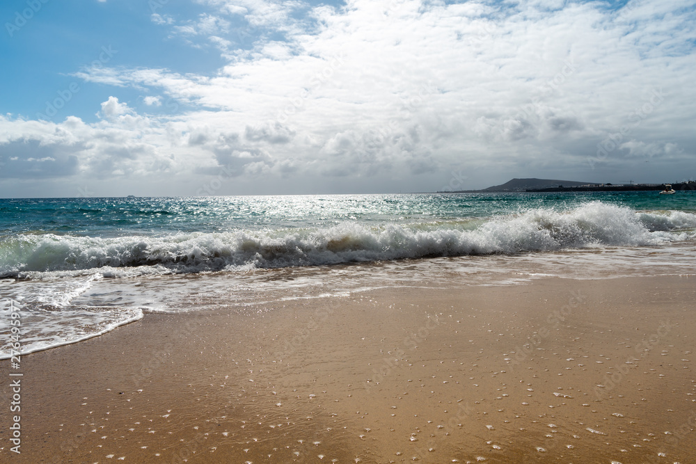 Panorama of beautiful beach and tropical sea of Lanzarote. Canaries Panorama of beautiful beach and tropical sea of Lanzarote. Canaries