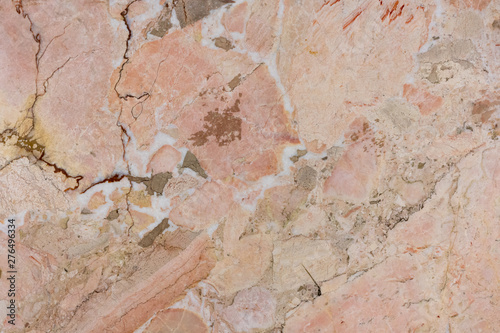 texture of old cracked red, yellow natural marble with stains of different size and color