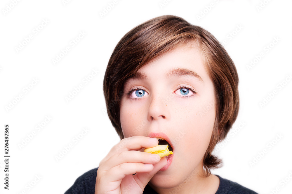 Handsome boy holds in his hands macaroni over white background. Handsome boy holds in his hands macaroni over white background.