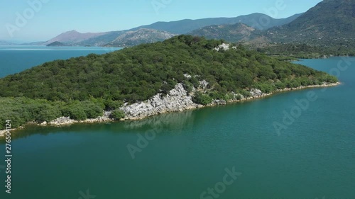 Very beautiful views of Lake Skadar in Montenegro taken from drone. Moračnik Monastery  is a Serbian Orthodox monastery on Moračnik island on Skadar Lake in modern-day Montenegro. It is positioned acr photo