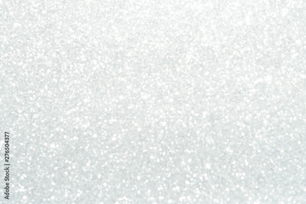 Silver sparkle glitter abstract bokeh background Christmas	