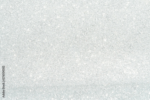 Silver sparkle glitter abstract bokeh background Christmas	