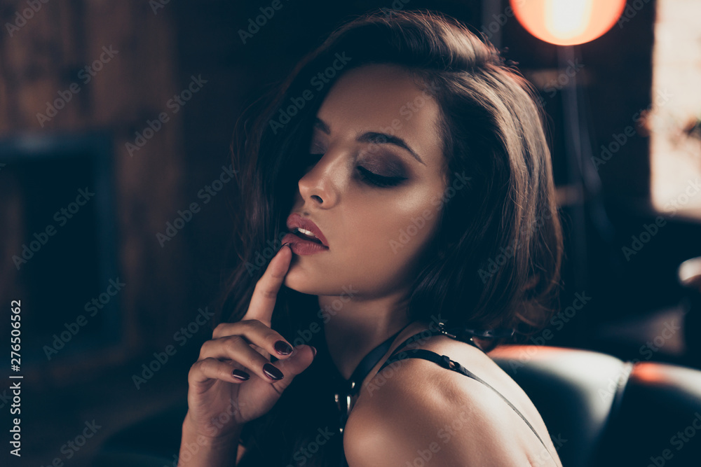 Close-up portrait of lovely exquisite attractive magnificent stunning charming wavy-haired lady in swordbelt enjoying lifestyle touching lip closed eyes at loft industrial interior wood - obrazy, fototapety, plakaty 