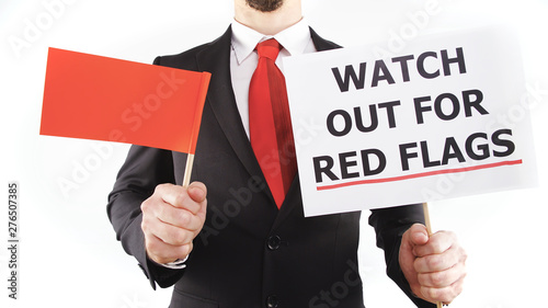 Headless businessman warning you about Red Flags