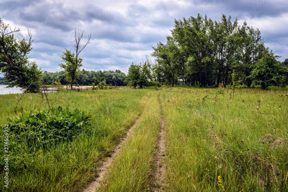 Fototapeta premium Road next to Vistula River bank near Warsaw in Poland