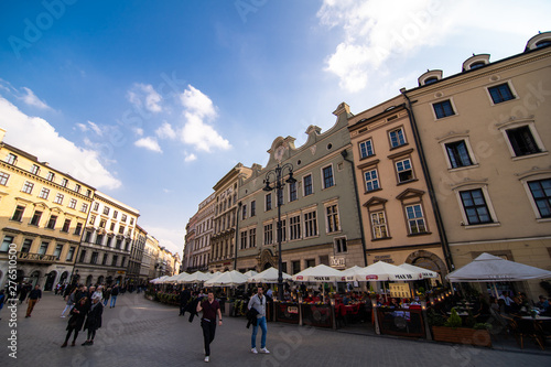 Poland, Krakow - April, 2019: Main Market Square and St Mary Church.