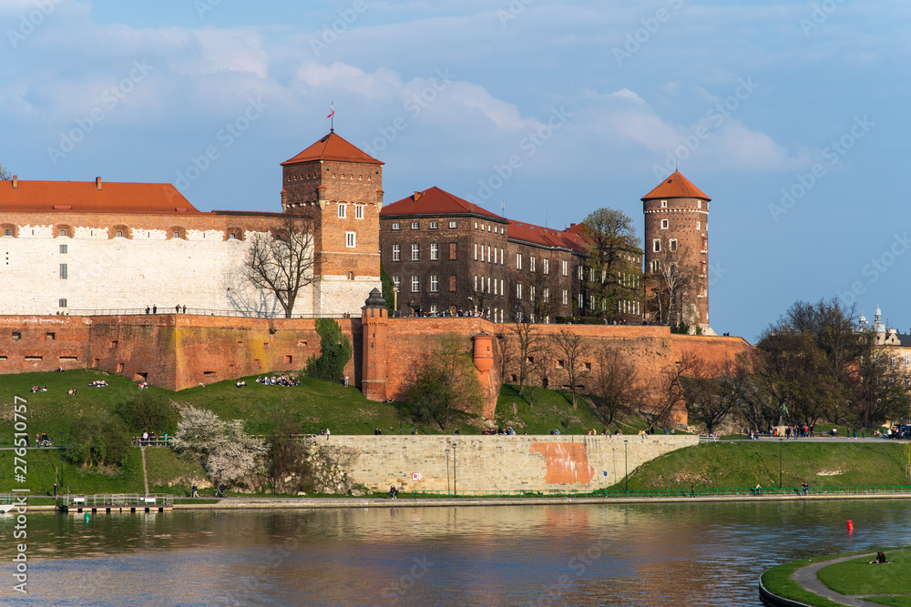 Fototapeta Krakow, Poland - April, 2019: Wawel castle famous landmark in Krakow Poland. Picturesque landscape on coast river Wisla.