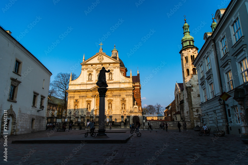 Fototapeta premium Krakow, Poland - April 2019: The Little Market Square, Krakow, Poland. Krakow - Poland's historic center, a city with ancient architecture.