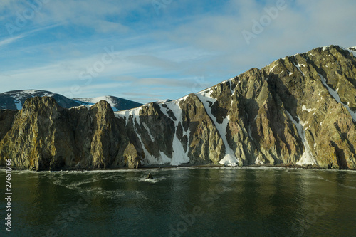 The top view on the northwest rocky coast of the Bering Sea, the Chukchi region. photo