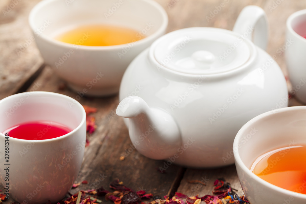 herbal tea in cups on a wooden background herbal tea in cups on a wooden background
