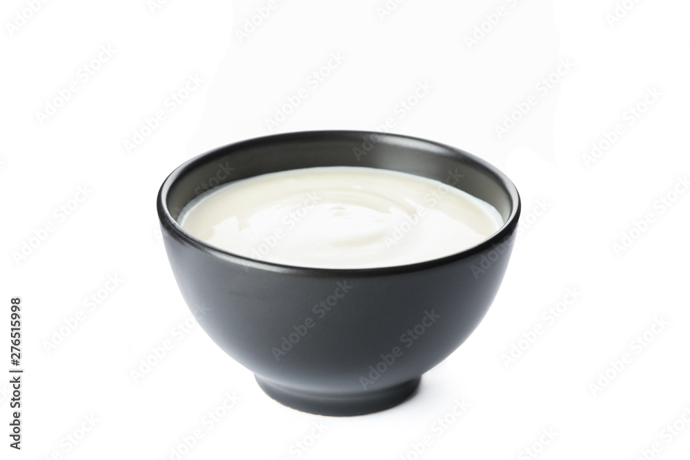 Bowl of sour cream yogurt isolated on white background Bowl of sour cream yogurt isolated on white background