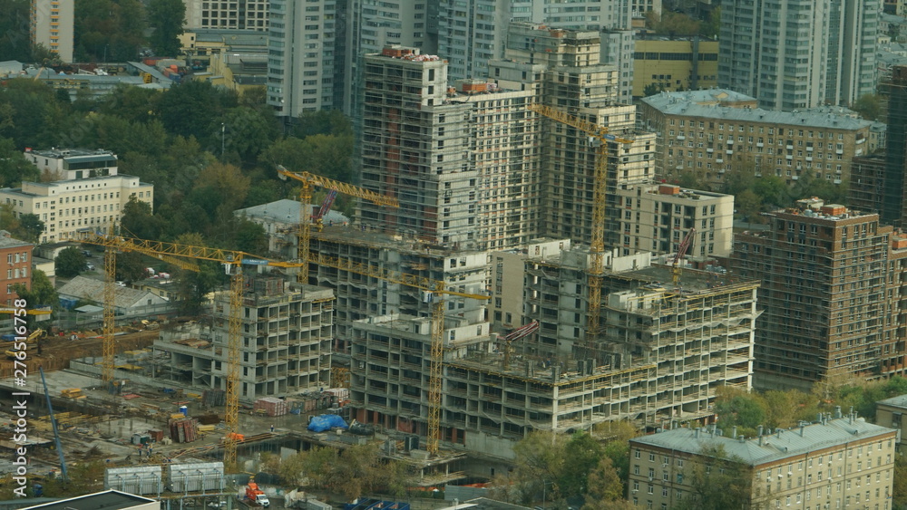 Naklejka premium Moscow cityscape, a mixture of buildings with buildings under construction