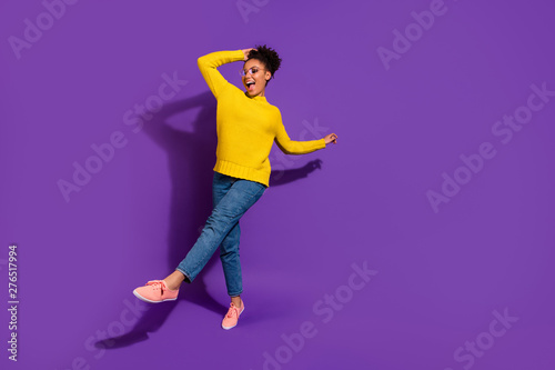 Full length body size view portrait of her she nice attractive lovely cheerful cheery carefree wavy-haired lady having fun time isolated over bright vivid shine violet background