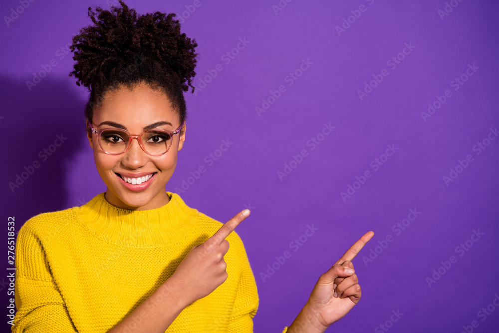 Close-up portrait of her she nice attractive cheerful cheery content wavy-haired girl showing way direction copy space ad advert isolated over bright vivid shine violet background - obrazy, fototapety, plakaty 