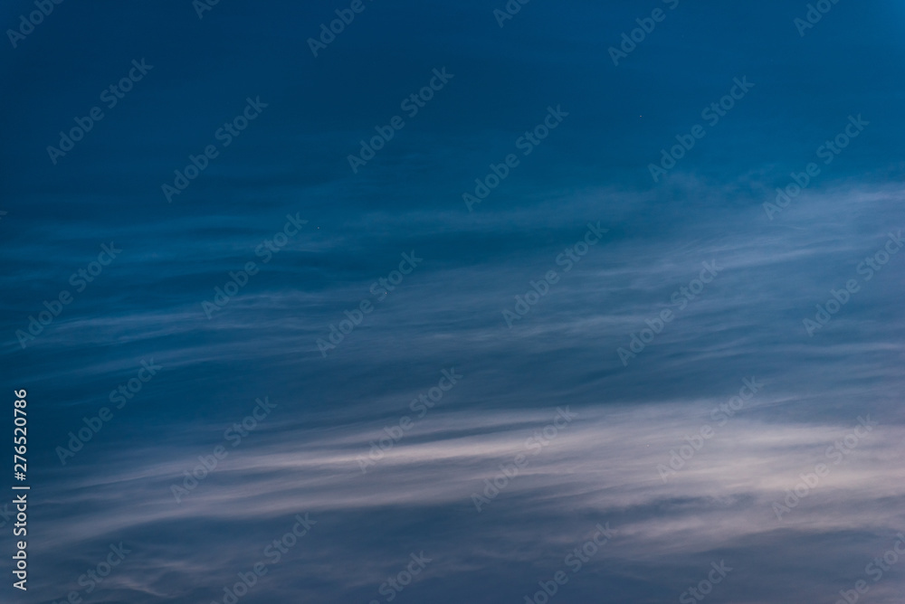 .Noctilucent clouds on a summer night close up