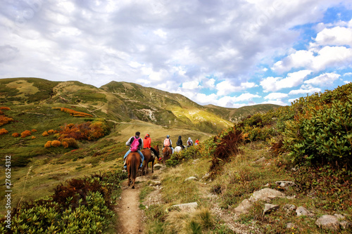 Horse riding in the Caucasus Mountains.