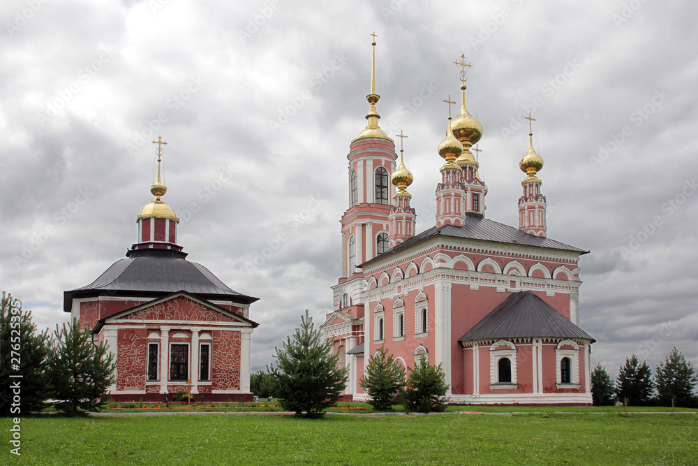 Church of Michael the Archangel and next to the small church of St. Flor and Lavra in Suzdal, Russia.