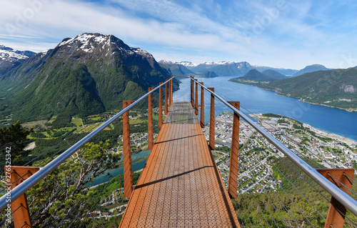 Rampestreken Viewpoint from a rusty footbridge overhanging the fjord (Norway) photo