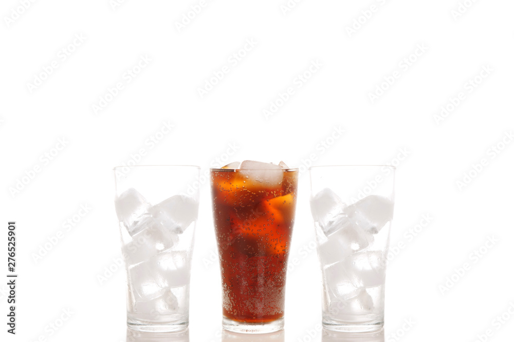 Soft Drink in The Glass and ICE in The Glass ISOLATED ON WHITE BACKGROUND. COPY SPACE. Soft Drink in The Glass and ICE in The Glass ISOLATED ON WHITE BACKGROUND. COPY SPACE.